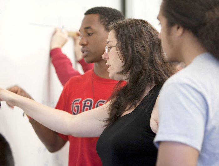 students writing formulas for their data science degree